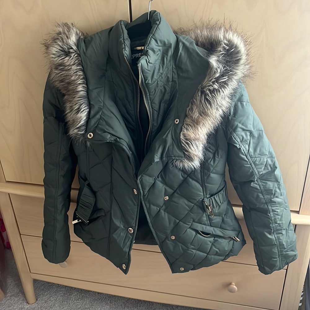 Express army green winter jacket with gold hardware and fur lined hood.